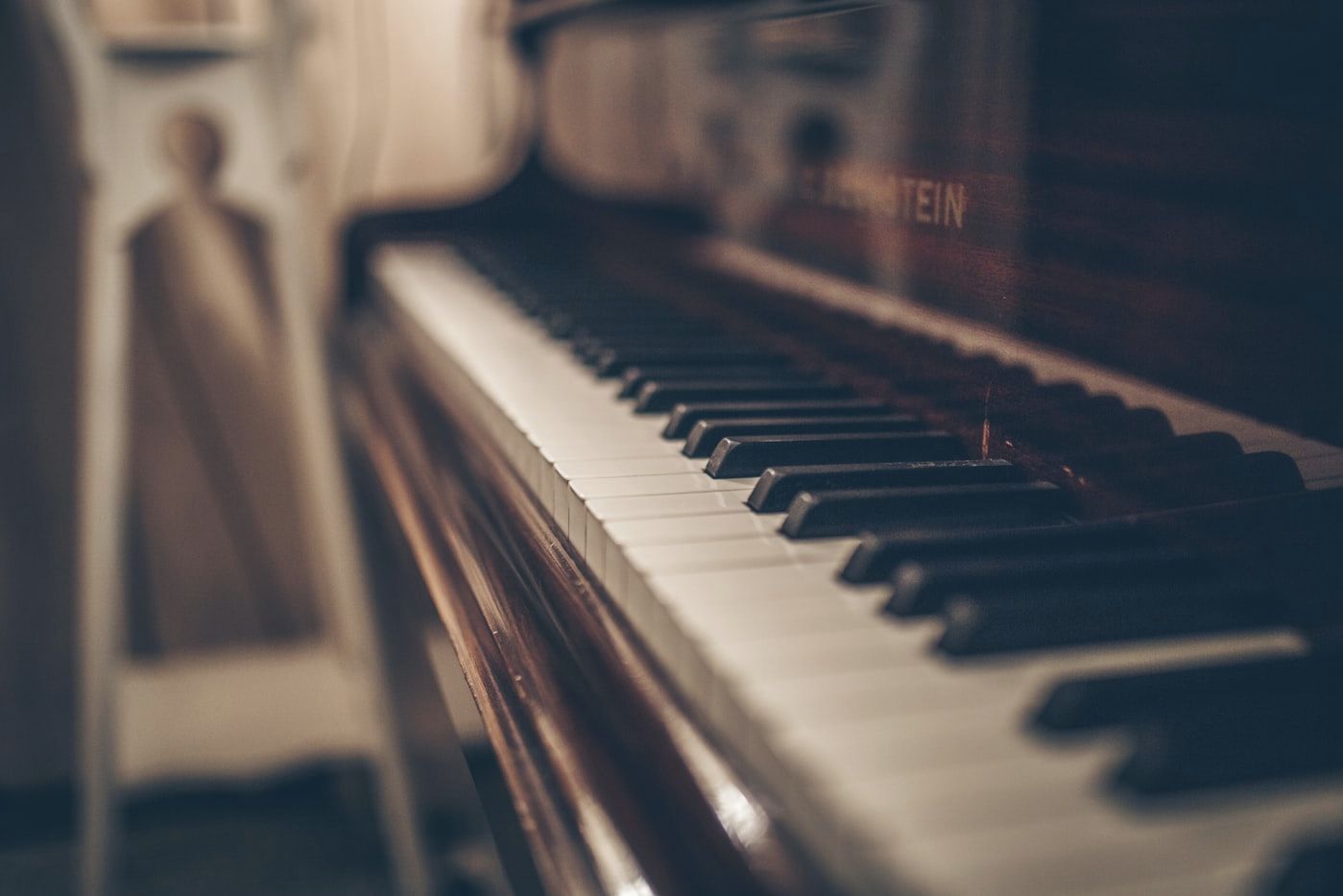 Muted piano keys in soft light
